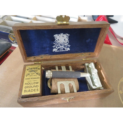 219 - Old Wilkinson sword razor blades and strop box