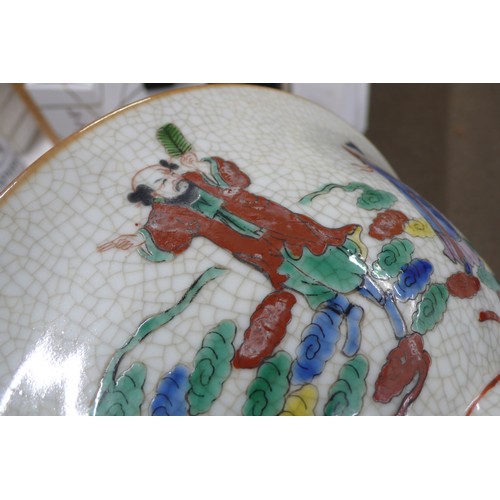 289 - A Chinese crackle glaze chow bowl having decoration of figures in multi-coloured glazes