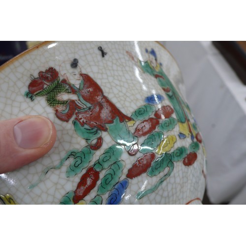 289 - A Chinese crackle glaze chow bowl having decoration of figures in multi-coloured glazes