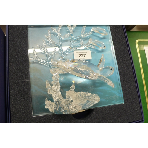 227 - A Swarovski turtle and fishes (boxed)