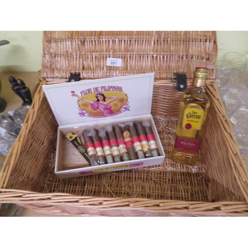 351 - Wicker basket with a bottle of tequila and a part box of Flor De Filipinas