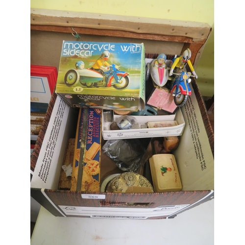 369 - box of ornaments, nicknacs, books including tin plate motorcyle with sidecar