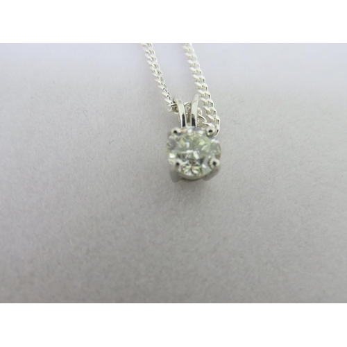 402 - LOT AMENDED - A diamond pendant in 9ct white gold on a silver chain - 1.10 ct. diamond