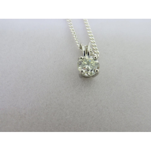 402 - LOT AMENDED - A diamond pendant in 9ct white gold on a silver chain - 1.10 ct. diamond