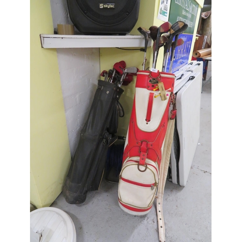 139 - Two sets of assorted golf clubs including irons