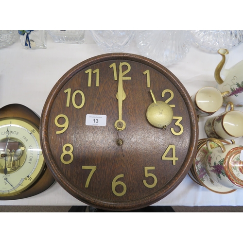 13 - A 1930's oak wall clock plus an aneroid barometer