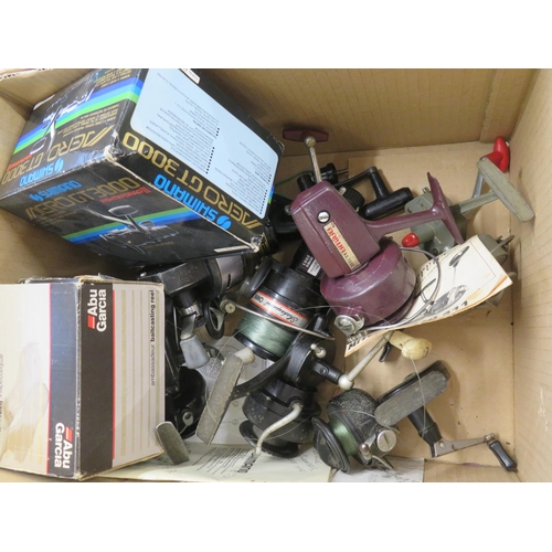 153 - A box of numerous fishing reels