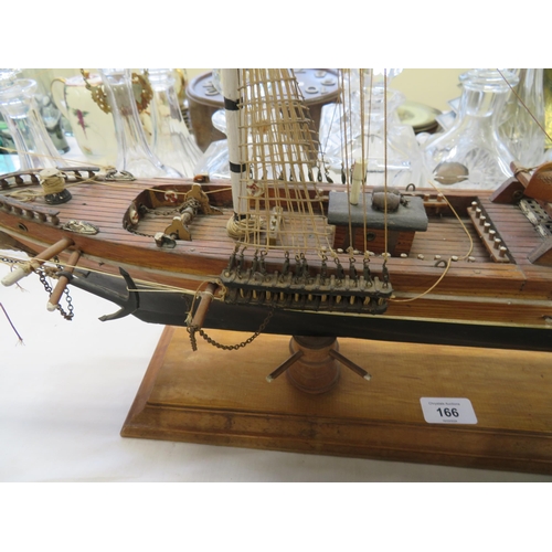 166 - A well made model of a three masted ship - length 36 ins approx