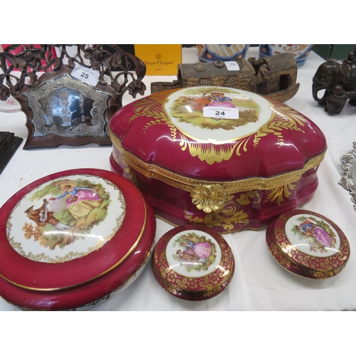 24 - Four porcelain boxes with covers