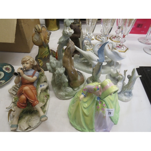 29 - A collection of porcelain and other animals and figures