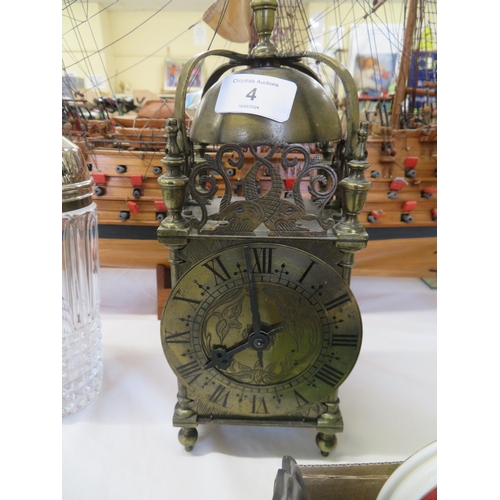 4 - A brass skeleton clock