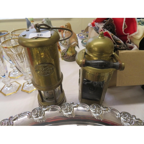 56 - Two brass miners lamps