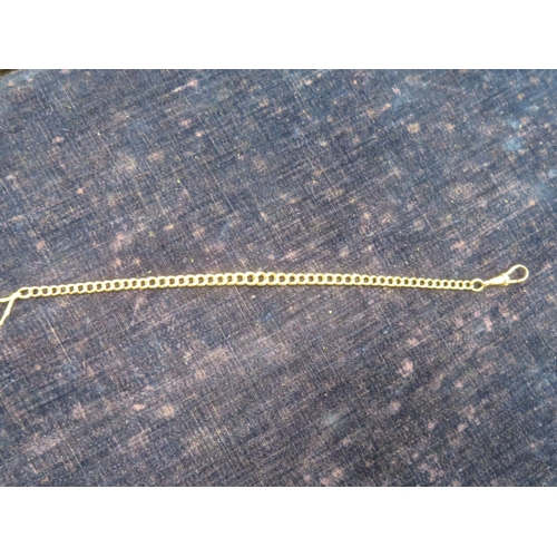 258 - 9 ct. gold chain link bracelet - wt. 12.4 grms