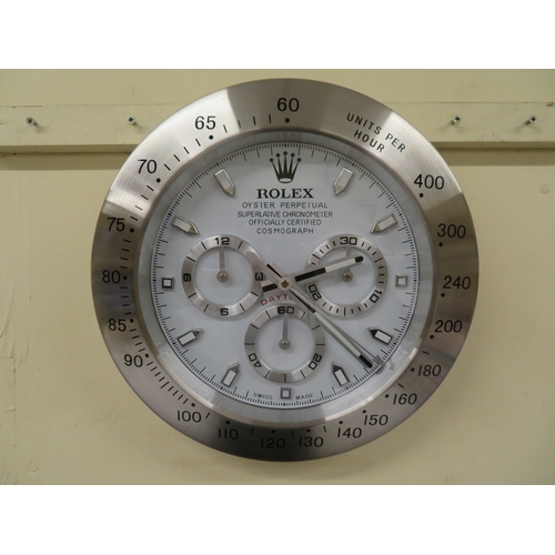 35 - Wall clock in the form of a white dial Rolex Daytona