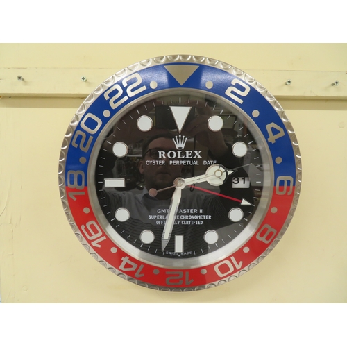 36 - Wall clock in the form of a black dial Rolex GMT Master II - Pepsi bezel