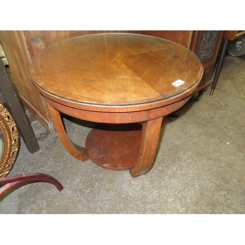 55 - 1930s Circular glass topped table plus a small cupboard with galleried top