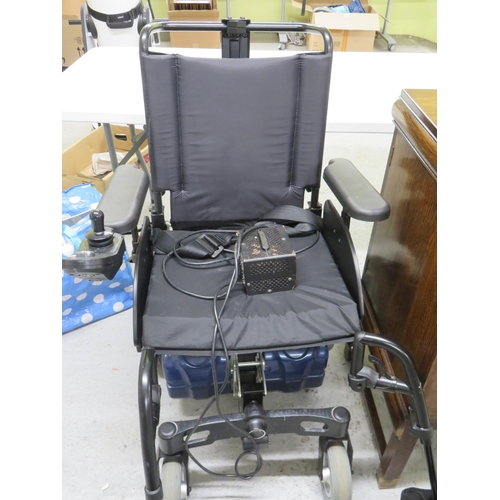 534 - Motorized wheelchair with remote control