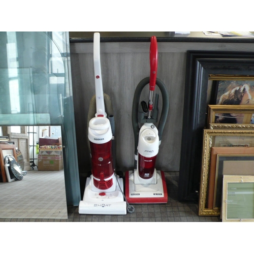 15 - Two upright vacuums