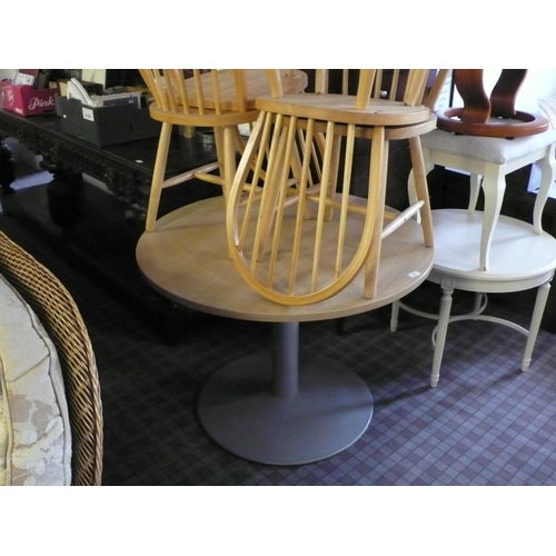 60 - Circular table on metal pedestal plus four spindle back chairs