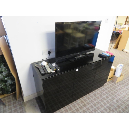 25 - Tv cupboard with single drawer inside plus Sony Bravia 40