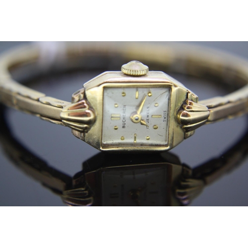 186 - Ladies 14ct gold Bucherer wristwatch with 9ct gold sprung strap, total weight 11grams