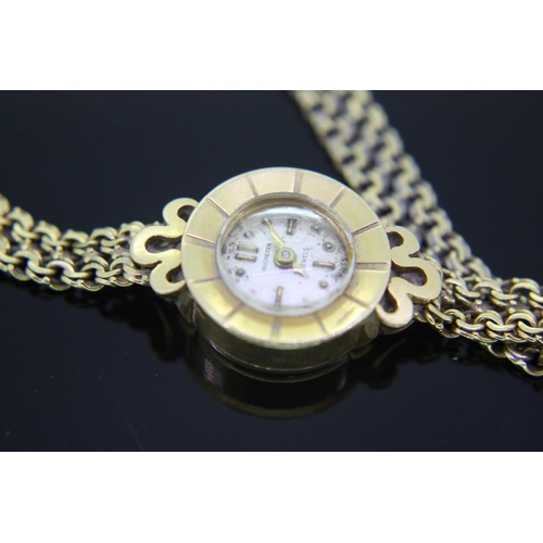 187 - Ladies 18ct gold Bucherer wristwatch with gold strap, total weight 17.2grams