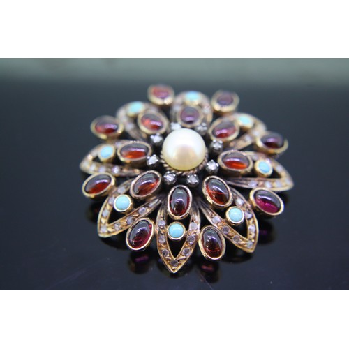 300 - Good quality flower shaped brooch with central pearl, cabochon garnets, turquoise and rose cut diamo... 