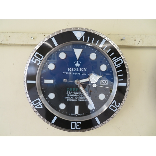 47 - Wall clock in the form of a Rolex black bezel Deepsea Sea- Dweller with date aperture