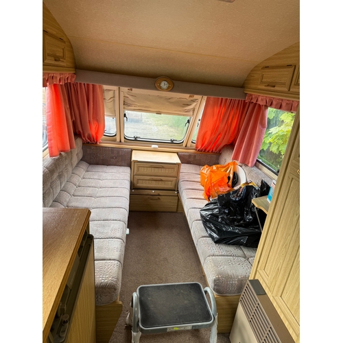 85 - Two berth caravan with shower, toilet, hob, grill and awning