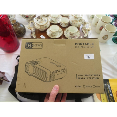 33 - LED portable projector