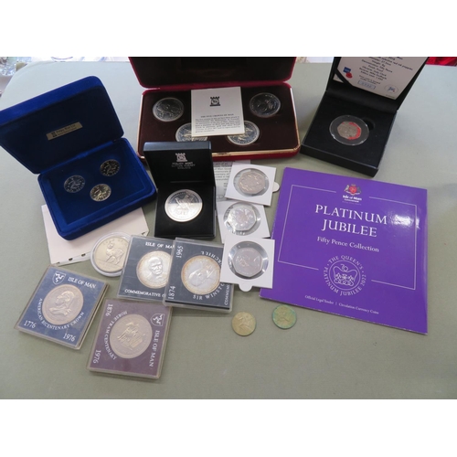 47 - Collection of boxed Isle of Man crowns, 50ps, £1 coin sets