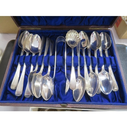 54 - Two sets of silver plated tea spoons, cased