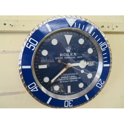 127 - Wall clock in the form of a Rolex blue bezel & Dial Submariner with date aperture