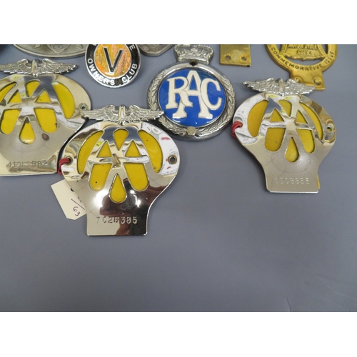 130 - Collection of mostly British car & Motor cycle badges:-
RAC
AA
Velocette Owners Club
British Motor C... 