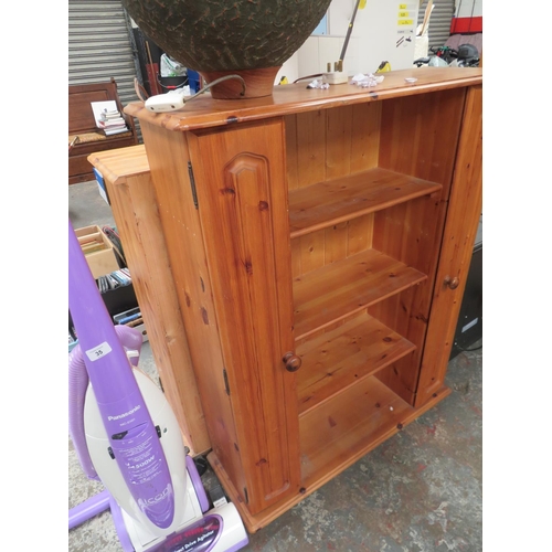 37 - Display cabinet with glass doors plus a three shelf unit with side doors