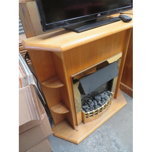 82 - Coal effect electric fire in wooden surround plus a music cabinet with door and lift up lid