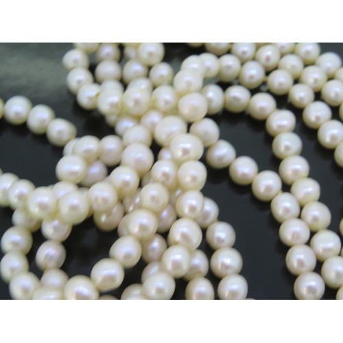 313 - Single long string of cultured pearls - length 48 ins