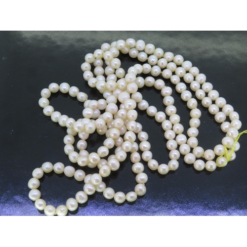 313 - Single long string of cultured pearls - length 48 ins