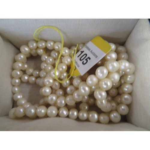 313 - Single long string of cultured pearls - length 48 ins