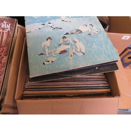 383 - Two boxes of LPs including Jerry Rafferty, John Lennon, Elton John, Kate Bush etc