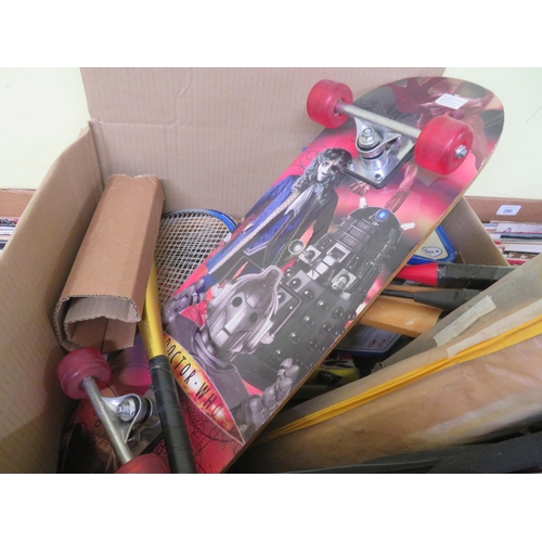 387 - Box of Rackets, ping pong paddles, skateboard etc