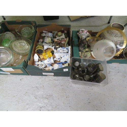 417 - Four boxes of ornaments, crockery and glassware