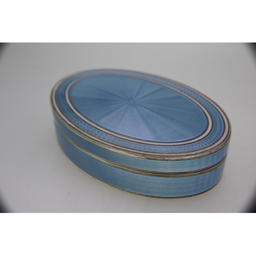 304 - A pale blue Guilloche enamel oval box marked 925, Maker G. S.