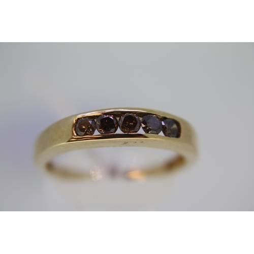 454 - 9 ct. yellow gold 5 stone cinnamon diamond ring - size R