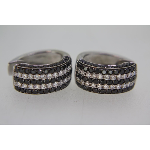 455 - Good pair of 14 ct. white gold half hoop earrings set with natural black and white RBC diamonds - wi... 