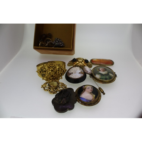 457 - A collection of interesting old brooches including agate and victorian plus earrings