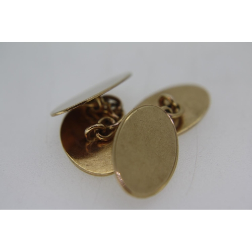 459 - A paid of 9 ct. gold cufflinks - wt. 6.2 grms