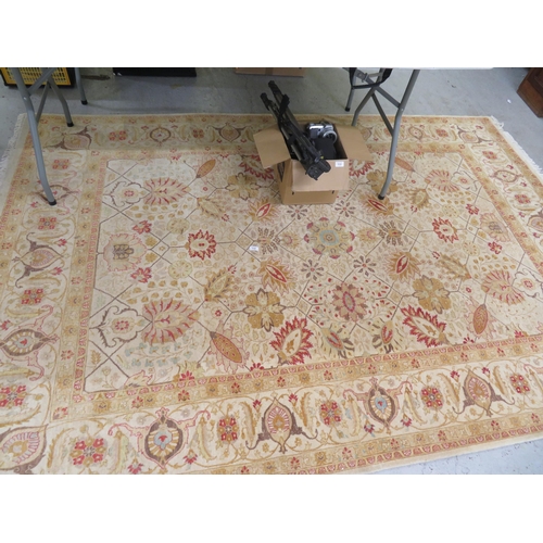 112 - Good quality rug in mostly cream and yellow wools with floral design, approx 112x73ins