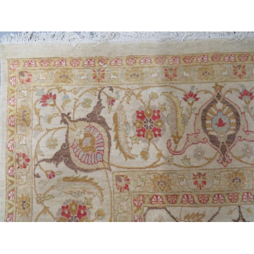 112 - Good quality rug in mostly cream and yellow wools with floral design, approx 112x73ins