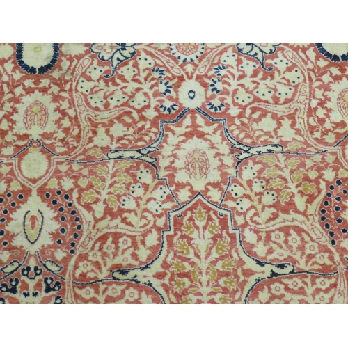 84 - Good quality rug, floral design in mostly red and cream wools, approx 87x55ins